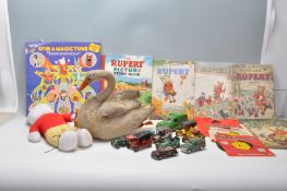 A collection of vintage children's toys to include