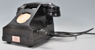A vintage early 20th Century bakelite rotary dial