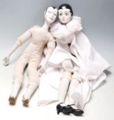Two vintage porcelain French Pierrot dolls, having