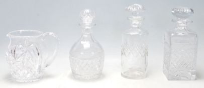 A group of 20th Century cut glass decanters to inc