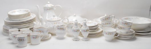 A large vintage fine bone china dinner service by