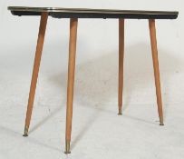 A vintage 20th century 1970’s low coffee table with marble effect top, gold colourway edge band