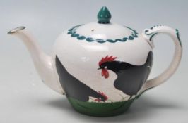 A RARE 20TH CENTURY BRISTOL POTTERY CERAMIC TEAPOT AND CREMER