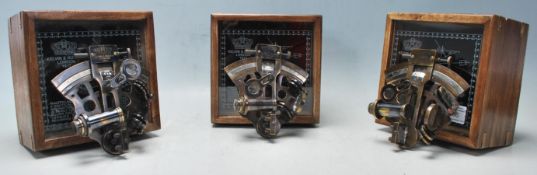 A group of three  20th century reproduction Kevin & Hughes London 1917 military brass navigational