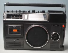 A vintage retro 20th century portable JVC 3080UKC radio tv cassette recorder 3-in-1 with multiple