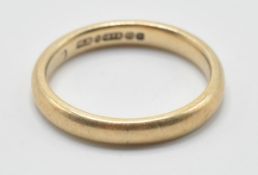 A hallmarked 9ct gold band ring of plain form. Hallmarked Birmingham 1930. Weight 3.2g. Size O.