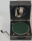 An early 20th Century portable / table top Decca gramophone having a black leatherette case  with