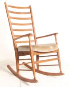 Scandart of High Wycombe, England A vintage 20th century Danish Scandart rocking chair - armchair