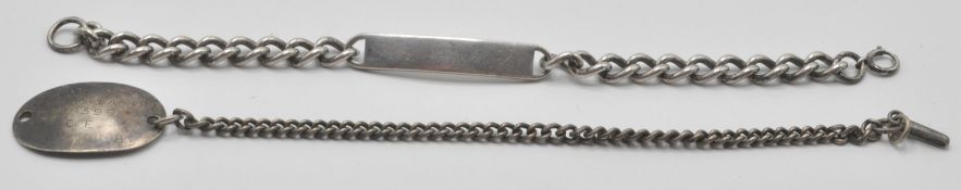 A silver hallmarked flat link / gentleman's ling curb identity bracelet having Birmingham silver
