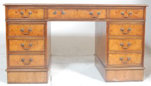 A good quality antique Georgian style walnut  twin pedestal desk with matching 2 drawer leather