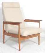 A retro vintage mid 20th century teak wood armchair having detachable soft cushions with period