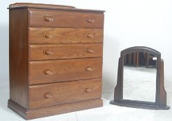 A 20th century Ercol style elm  chest of drawers by Jentique. The chest with an upright bank of