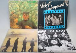 A collection of four vintage vinyl LP Long play records to include Echo and The Bunnymen - Songs
