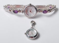 A ladies Gianni Vecci silver bracelet watch having a round case with a mother of pearl face and