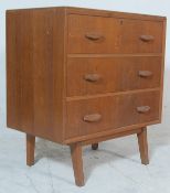 Gplan - Ernest Gomme. A retro vintage light oak chest of drawers having 3 drawers with shaped