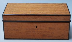 A vintage retro Alfred Dunhill walnut cigarette box having ebonised borders and escutcheon to the