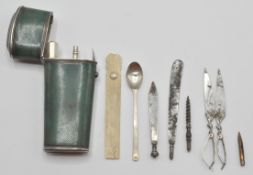 An early 19th Century Georgian etui of tapering form, having a green shagreen finish with a silver