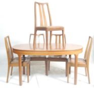A retro 20th Century teak wood extendable dining table and matching chairs by Nathan. The oval table