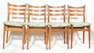 A set of 4 mid century Stoe of Yugoslavia beech wood dining chairs of utility form. Each with