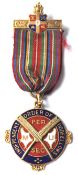 A hallmarked 9ct gold 1930's Independent Order of Oddfellows medal having blue and red enamelling on