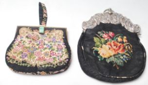A good 20th century antique petit point bag with faux carved jade clasp and floral decoration to the