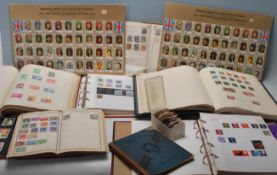 A large collection of stamps dating from the 19th century to include several Penny Reds, Penny Blue,