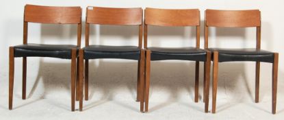 A set of four retro 20th century teak wood dining chairs having a teak wood frame with black
