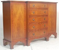 A Regency revival antique style mahogany breakfront bookcase. Raised on bracket feet with a series
