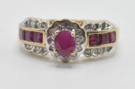 A hallmarked 9ct gold ring being set with rubies and diamonds having one central oval cut ruby