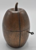 An 18th Century Georgian style fruitwood tea caddy in the form of a melon with lock and key to