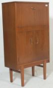 A retro mid century. circa 1950's Danish inspired teak wood cocktail / drinks cabinet. The cabinet