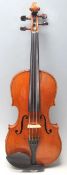 An antique vintage 4/4  violin complete in the canvas carry case along with bow. The strung violin
