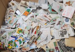 A large collection of 20th century cigarette cards to include sets, part sets and loose cards.