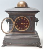 An early 20th Century Edwardian slate & marble mantle clock having a gilt domed pediment top,
