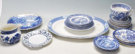 A COLLECTION OF WILLOW BLUE AND WHITE POTTERY CERAMIC PLATES