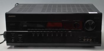 An Onkyo TX-SR608 AV receiver processor in black gloss having 6 HDMI sockets, 7.2 channels, 3D ready