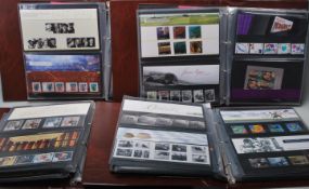 A large collection of 20th Century British stamps within a set of four Royal Mail presentation