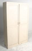A mid century retro 1950's school cupboard / factory industrial. Painted white in shabby chic style,