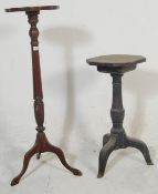 An 18th century country oak wine table of rustic form. Raised on splayed tripod base with turned