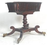 An 18th century Regency - George III mahogany jardiniere / plant stand. Raised on a stunning