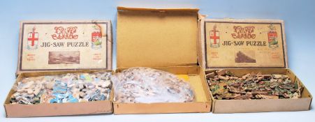 A collection of three early 20th Century wooden toy jigsaws to include a 200 piece White Star Liner
