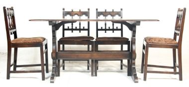 A VINTAGE MID 20TH CENTURY OLD COLONIAL ERCOL DINING TABLE AND CHAIRS
