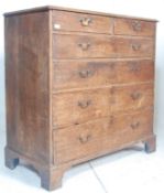 A George III 19th century oak 2 over 4 North Country chest of drawers. Raised on bracket feet with 2