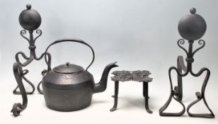 A late 19th Century Early 20th Century Victorian cast iron fireside companion set consisting of a