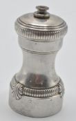 A 20th century French silver hallmarked pepper grinder having twist top with adjustable knob atop