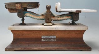 A set of Victorian marble and oak scales, marked to the pan, Yandell and Son, Bristol, with cast