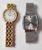 A mid century, believed 1960's Omege Geneve white metal gents wristwatch. The silvered dial with