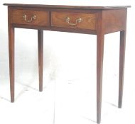 A 19th century George III mahogany writing table desk. The desk being raised on square tapering legs