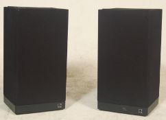 A pair of Kef Celeste III speakers type SP1107 No 16620 having  black fabric protection, raised on a