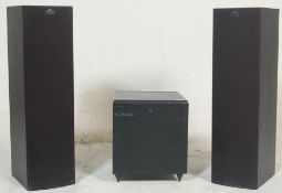 A vintage KEF PSW 1000 floor standing Subwoofer having adjustable volume buttons to the back and